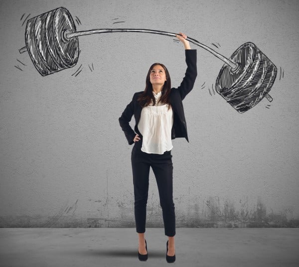 Woman in a suit exercising