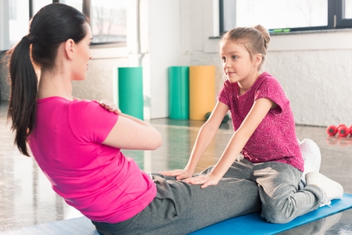Mother and daughter in gym - local workout gyms in Solana Beach