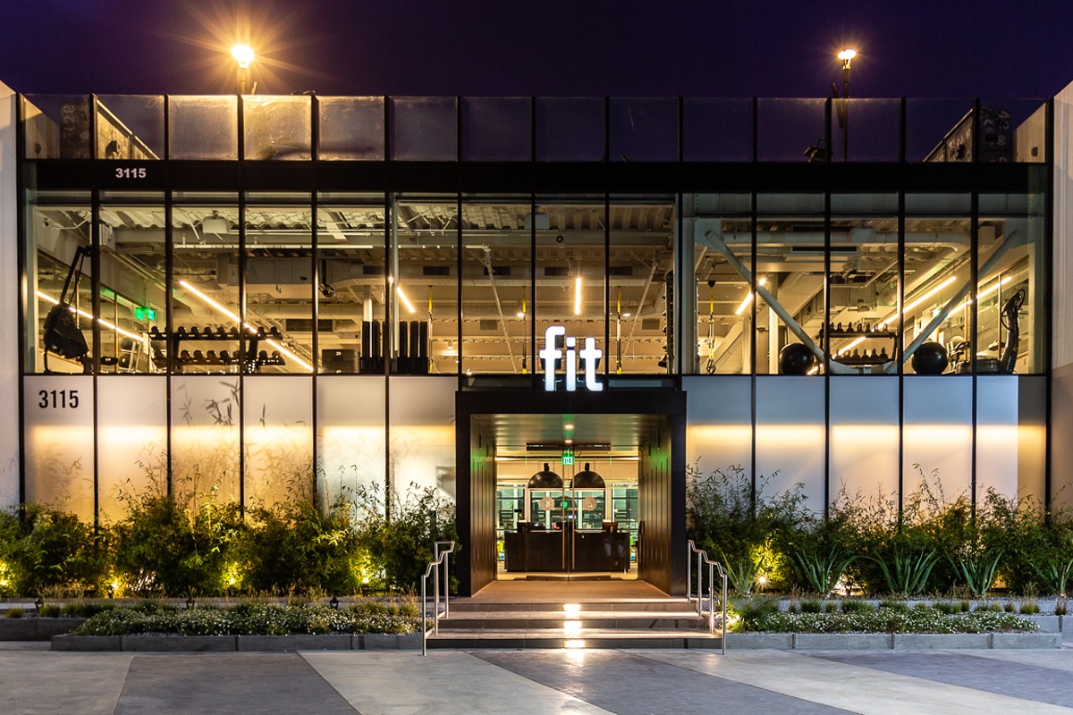 The entrance to a building at night.